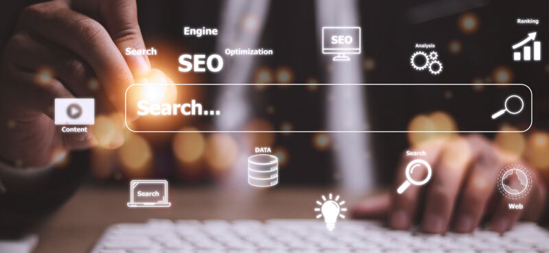 Long Island business owner researching local SEO strategies on a computer